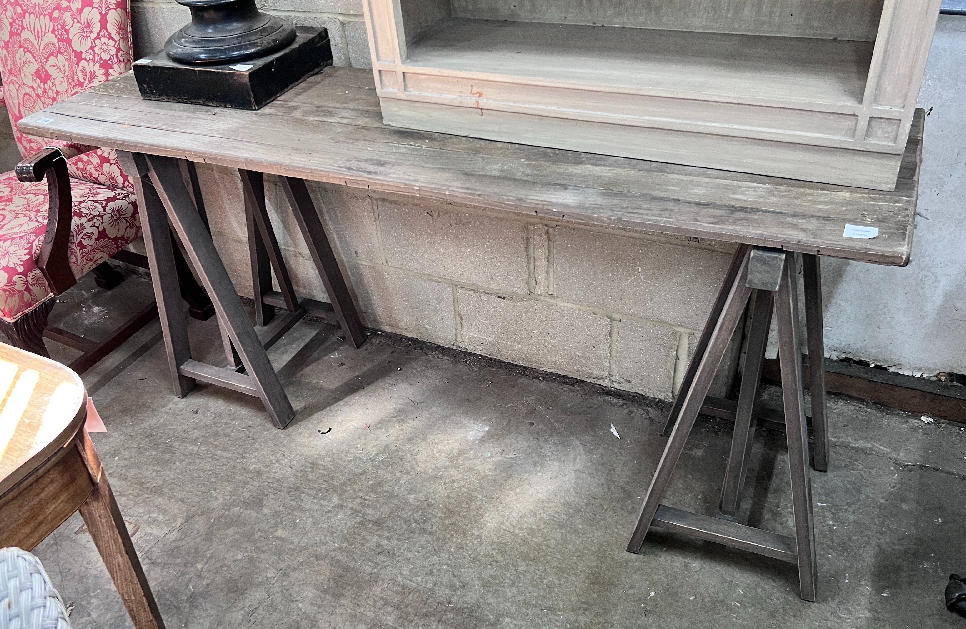 A Victorian style trestle table with planked top, length 175cm, width 49cm, height 82cm *Please note the sale commences at 9am.